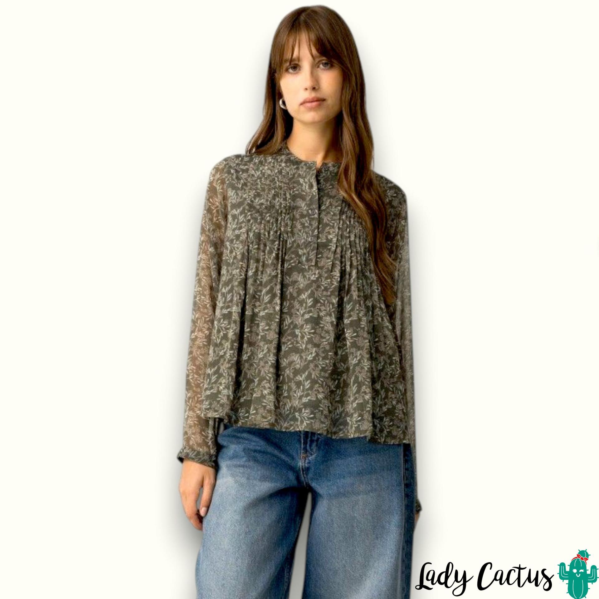 Blusa escote redondo y cierre frontal discreto