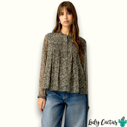 Blusa escote redondo y cierre frontal discreto