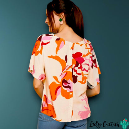 Blusa Gandía blanca con espalda abotonada de Smile para detalle original femenino