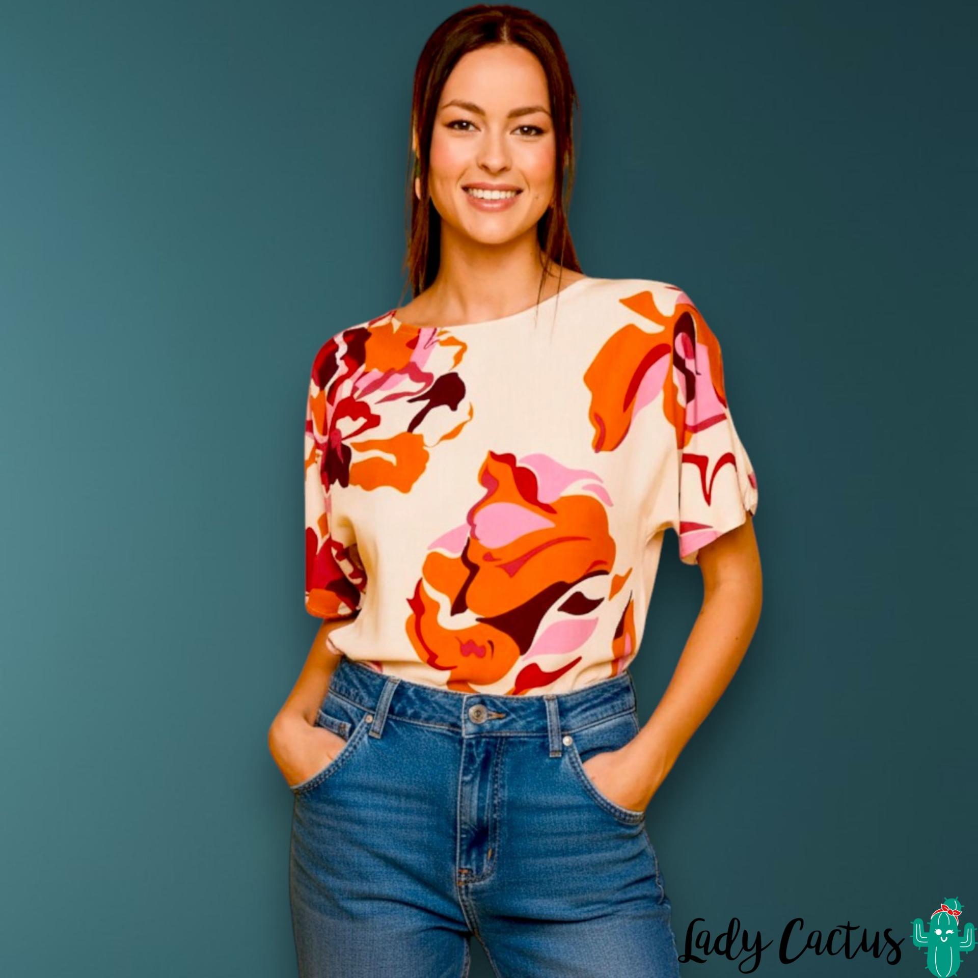 Blusa Gandía blanca de Smile en Lady Cactus con estampado puntillista sutil y arte urbano