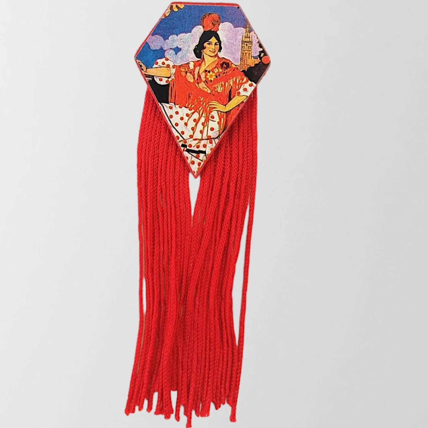 Broche original de madera con silueta de la Giralda de Sevilla y flecos