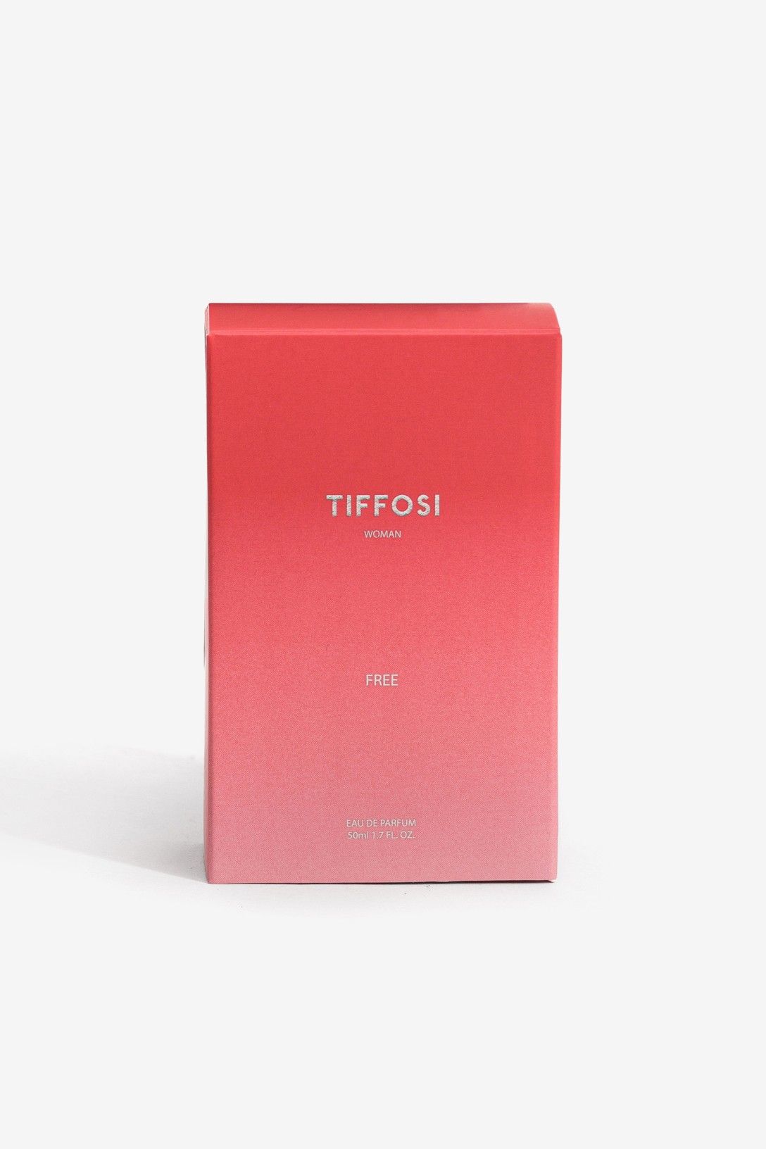 Primer plano de la marca Tiffosi Woman en el frasco del perfume Free.