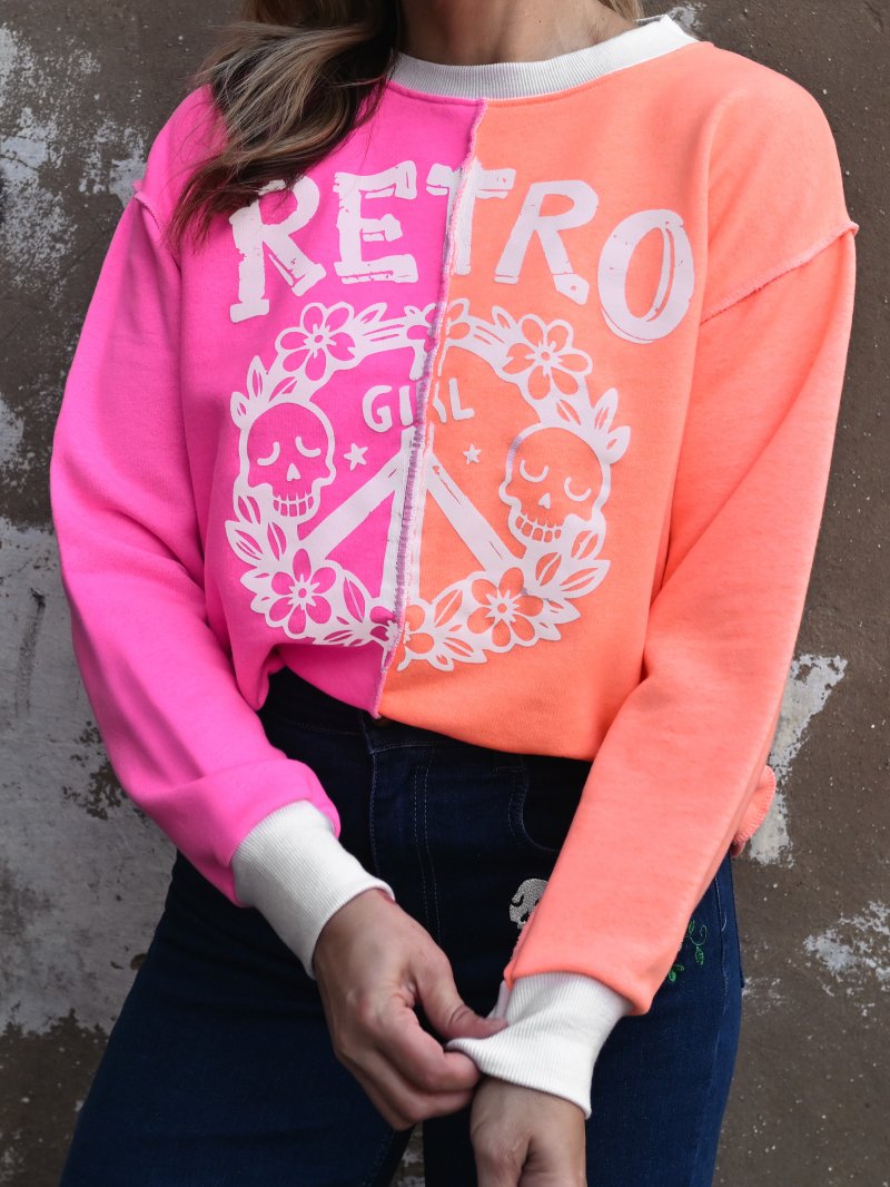 Detalle de los acabados en cuello y puños de color crema suave de Aire Retro.
