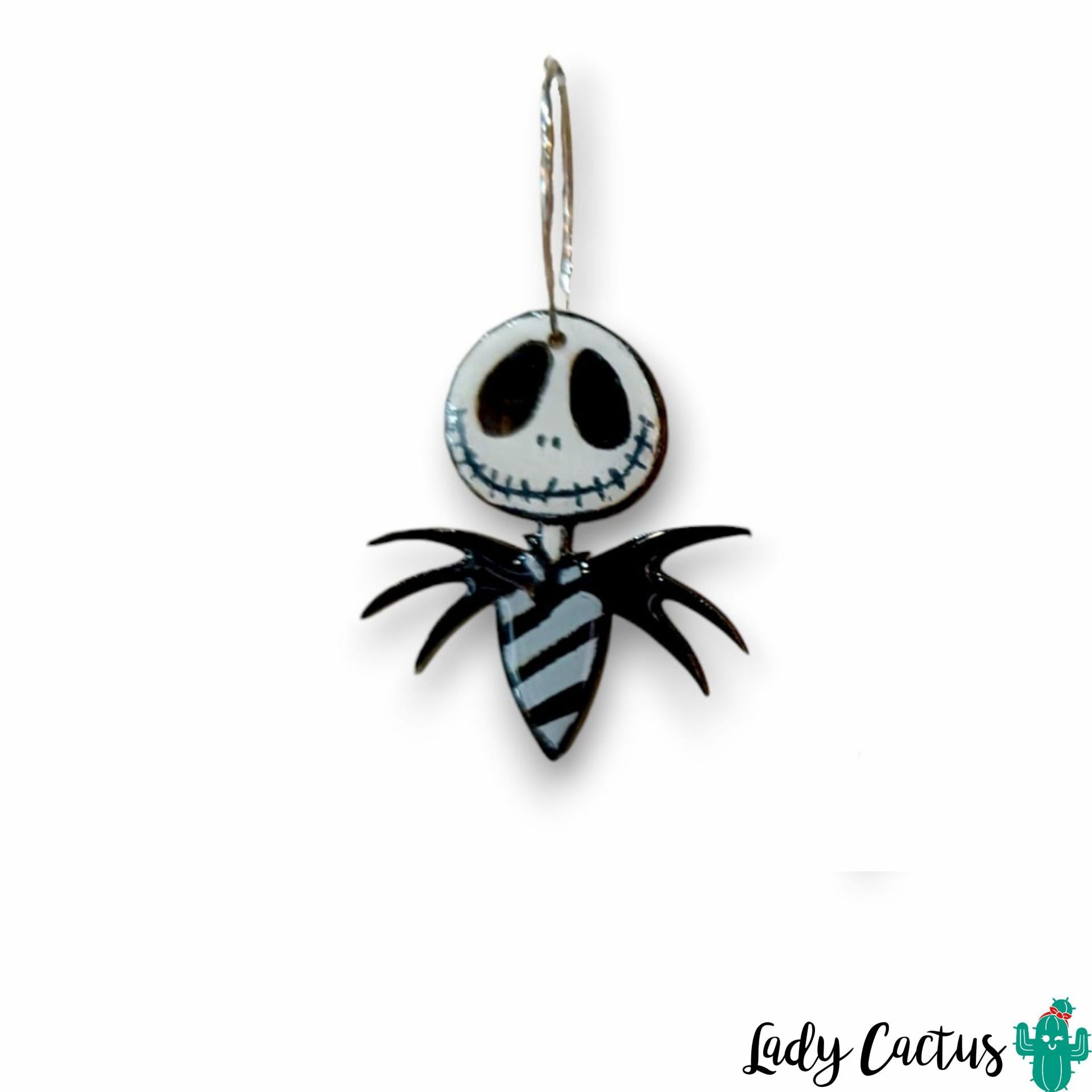 Detalle de la ilustración de Jack en pendientes de madera