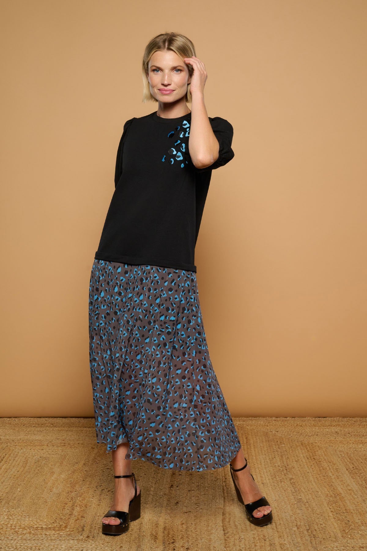 Vestido largo con efecto falda animal print de Minueto