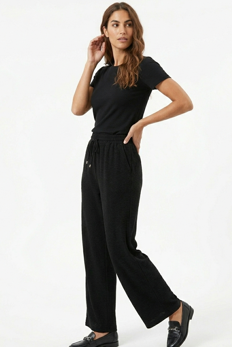 Pantalón negro elegante con ajuste elástico de cordón