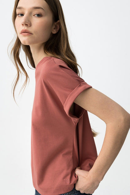 Camiseta de manga corta doblada color rosa para mujer