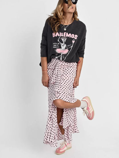 Outfit de Lady Cactus con jersey vintage y actitud rockera.