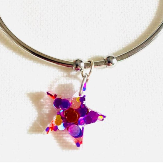 Pulsera de acero inoxidable con dije de estrella de resina rosa brillante