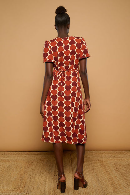 Vestido femenino cruzado con botón invisible de seguridad