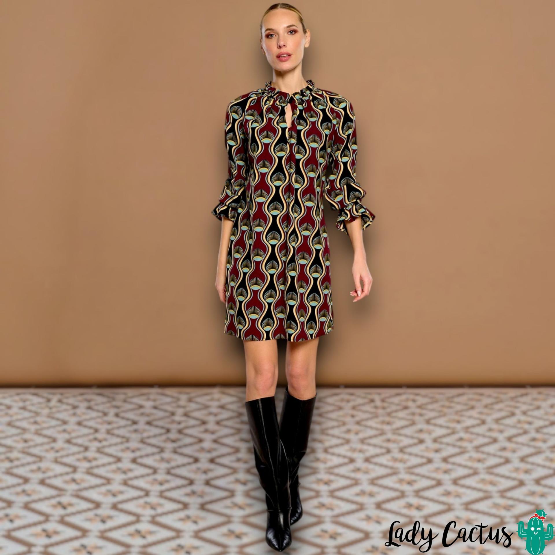 Vestido Aurora de Minueto en Lady Cactus con estampado geométrico vibrante y elegancia urbana