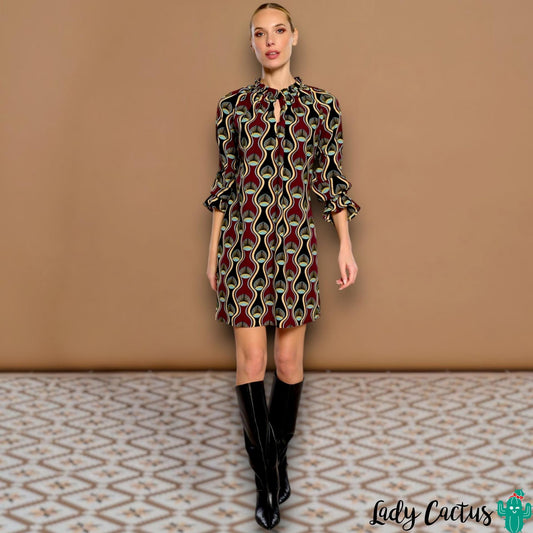 Vestido Aurora de Minueto en Lady Cactus con estampado geométrico vibrante y elegancia urbana