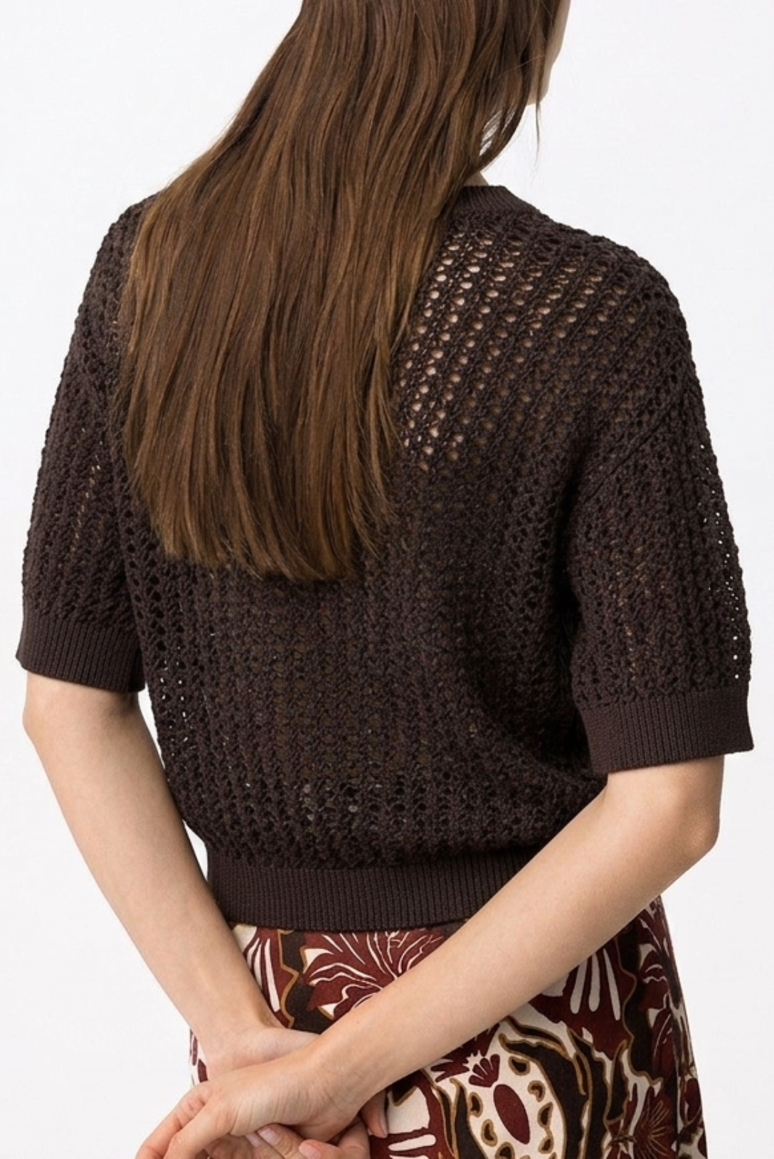Top de mujer de Tiffosi en color marrón oscuro con mucha caída.
